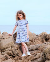 Organic Cotton Girls Dress with Blue Animal Print on Rocks