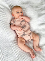 salmon pink organic cotton bodysuit with leopard animal print