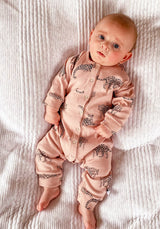unisex pink organic cotton onesie with leopard animal print