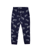 Flatlay of organic cotton kids joggers in navy blue with animal print