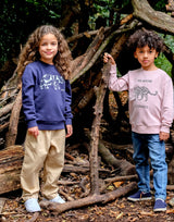 Girl and boy wearing navy blue and pink organic cotton unisex sweatshirt with animal prints