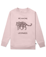 Flatlay of unisex organic cotton kid's sweatshirt in pink with leopard animal print