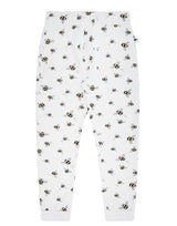 Flatlay of unisex organic cotton kid's joggers in off-white with bee animal print