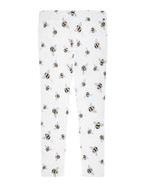 Flatlay of unisex organic cotton kid's leggings in off-white with bee animal print